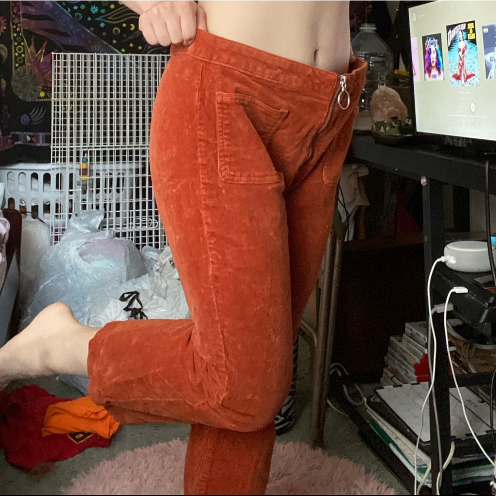 Orange zip up jeans